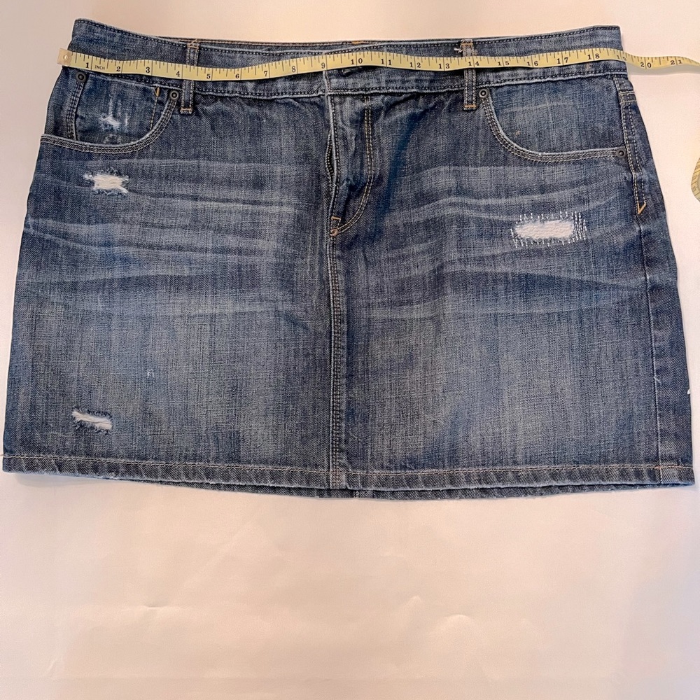 Loft distressed denim skirt.